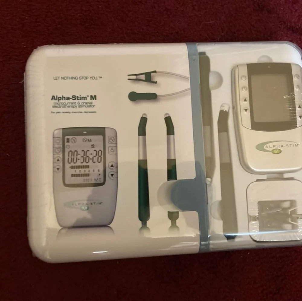 M Cranial Electrotherapy Device - Silver/Black. Brand New Factory Sealed
